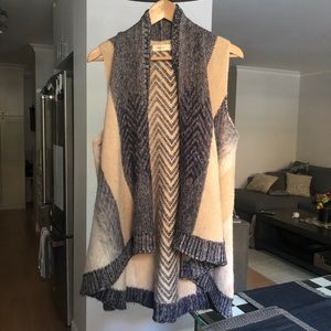 Cozy, mid-length sweater vest